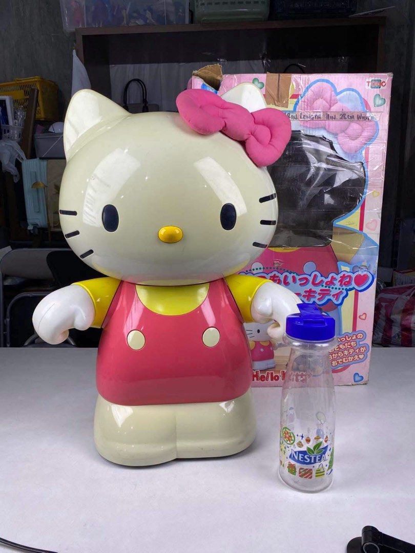 Vintage Sanrio Hello Kitty Talking Interactive Toy with Box (Category: Interactive Toys) located in Manila. Submitted by janetecson05 (Listing ID 1467219974, Image 1). Description: - Sanrio Kitty large interactive figure - Wears an iconic pink dress with yellow sleeves and a big pink bow - Equipped with yellow control buttons and power switch on the back panel - Comes with the original Japanese retail box - Perfect addition for Sanrio and Kitty c