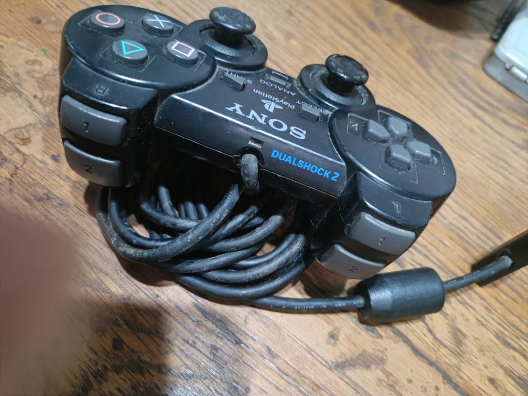 Vintage Sony PlayStation 2 (PS2) DualShock 2 Analog Controller Php700. (Category: In-Game Products) located in Taytay. Submitted by abeatrice77985 (Listing ID 1467359017, Image 3). Description: Vintage Sony PlayStation 2 (PS2) DualShock 2 Analog Controller Php700..