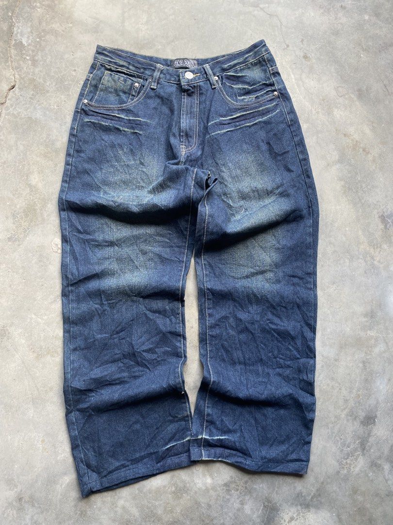W:32 L:40 R:14 Hem:10 (Category: Jeans) located in Manila. Submitted by noble.daniel (Listing ID 1467261467, Image 2). Description: Dark blue denim jeans with heavy fading and whiskering on the front. Unique frayed distressing and stitching details on both back pockets. Classic five-pocket setup with belt loops. Straight leg fit, slight flare at the hems. Brand tag on the back waistband and inside front collar. Sturdy material with natural wear p