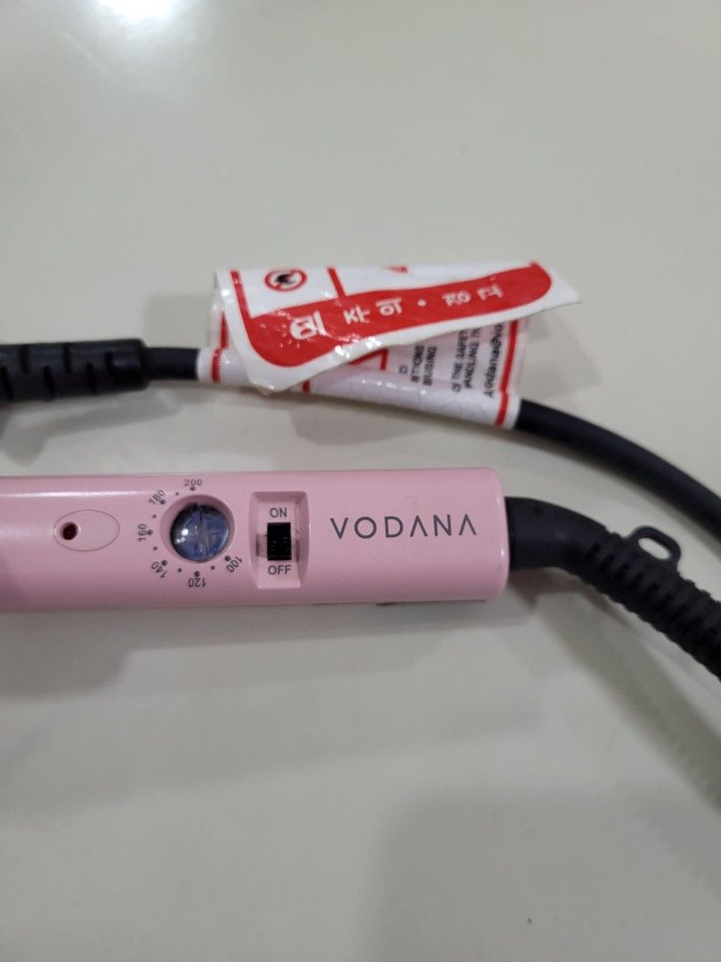Vodana GlamWave Curling Iron Pink (Category: Hair) located in Manila. Submitted by mayakimlim18549 (Listing ID 1467255022, Image 3). Description: Vodana Glamwave Curler, From Olive Young Korea Condition: Good condition, barely used No original box included Rfs: Never really used it, barrel is too big for my length of hair :< Courier fee to be shouldered by buyer..