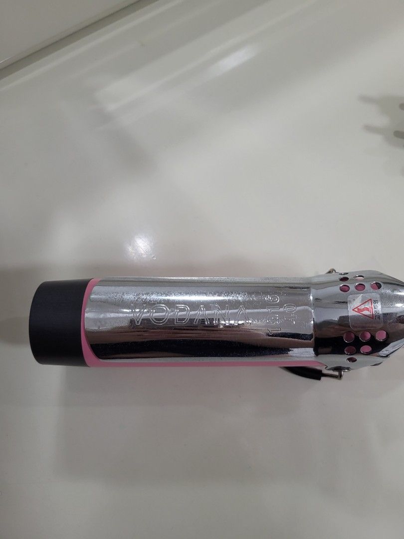 Vodana GlamWave Curling Iron Pink (Category: Hair) located in Manila. Submitted by mayakimlim18549 (Listing ID 1467255022, Image 2). Description: Vodana Glamwave Curler, From Olive Young Korea Condition: Good condition, barely used No original box included Rfs: Never really used it, barrel is too big for my length of hair :< Courier fee to be shouldered by buyer..