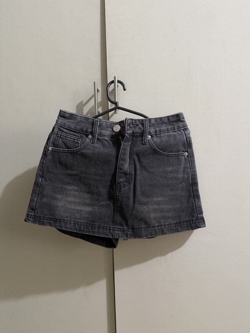 Washed Black Denim Skirt Skorts (Category: Skirts) located in Manila. Submitted by karely (Listing ID 1467249665, Image 1). Description: - Color: Washed black - Style: Denim skorts (shorts underneath with a skirt front layer) - Closure: Front button with zip fly - Pockets: Classic pocket styling - Fit & Use: Great everyday piece, easy to match with tees and tops.