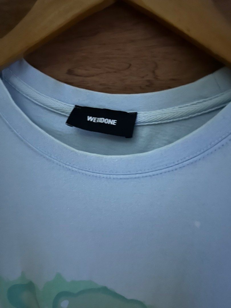 WE11DONE Blue Green Bear Graphic Tee Size S (Category: Tshirts & Polo Shirts ) located in Davao. Submitted by cedcts (Listing ID 1467344024, Image 2). Description: Welldone 23x28 300.