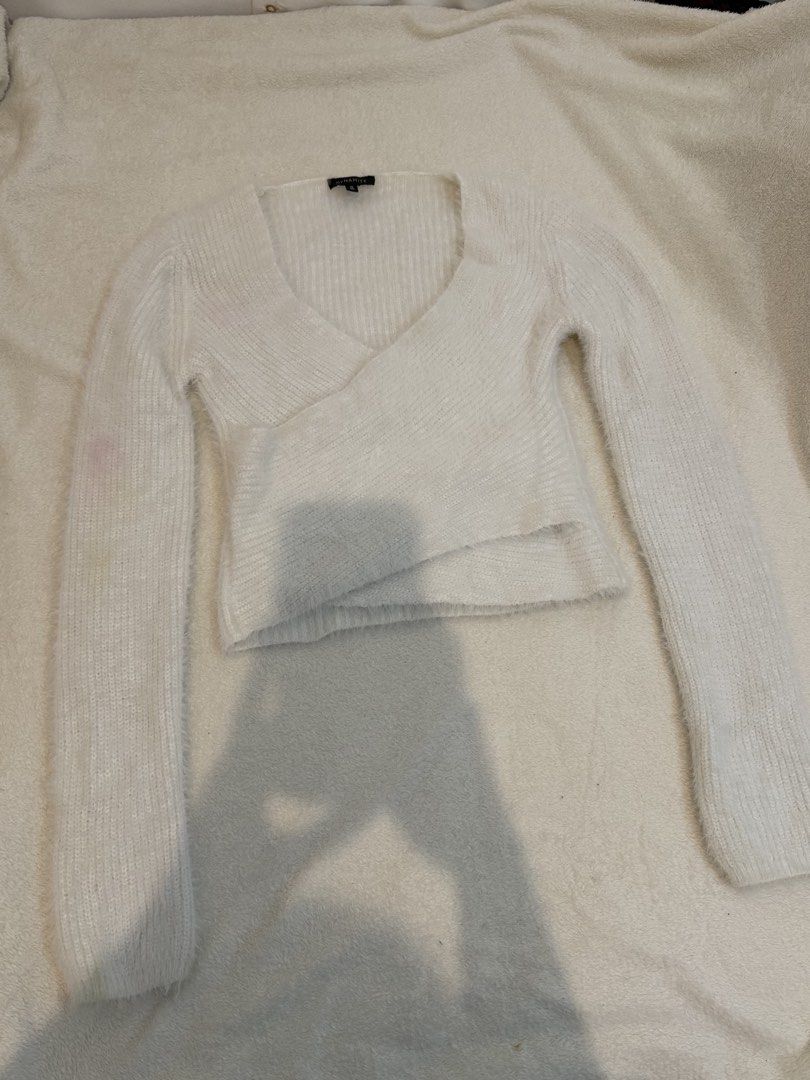 White Fuzzy Wrap Sweater (Category: Others Tops) located in Mandaue City. Submitted by meh.soh (Listing ID 1467269120, Image 2). Description: White Fuzzy Wrap Sweater Brand: Dynamite (from 🇨🇦) Size: M Very fluffy fabric Note: there is a minimal stain on the sleeves (visible in the photos provided) Mode of Payment: Gcash Delivery: Maxim (df shouldered by buyer) Location: Cubacub, Mandaue Cebu.
