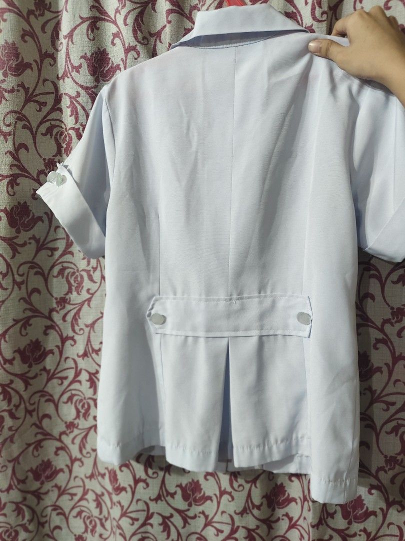 white nursing clinical uniform set (Category: Medical Supplies & Tools) located in Bulacan. Submitted by angel.decluttersx (Listing ID 1467296031, Image 3). Description: small size‼️ Waistline 25-26 inches ww provided (refer to photos pls) for small bodyframe complete buttons‼️ ‼️no issue‼️ in excellent condition pinatahi purchased first ₱1,500.