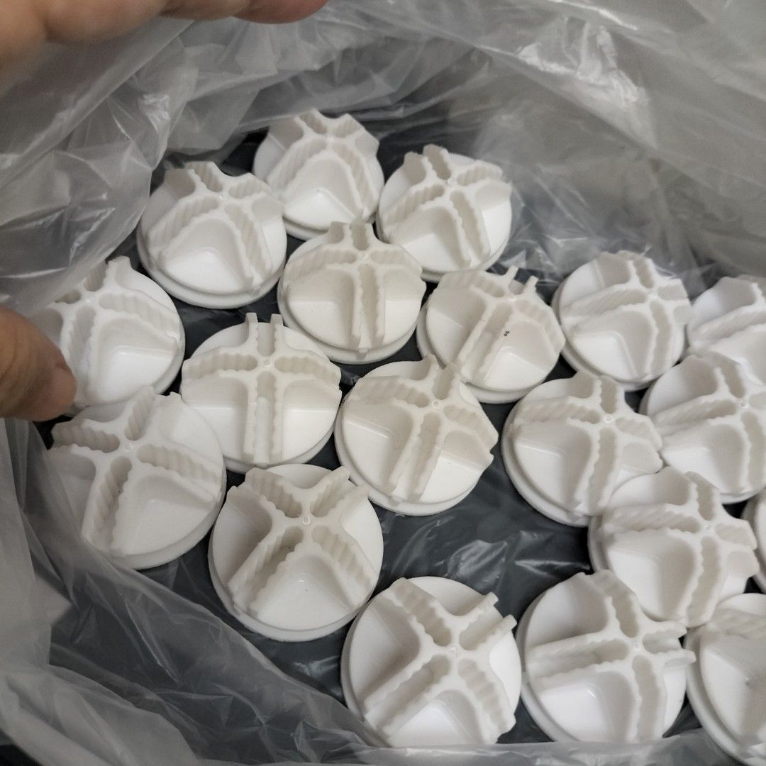 White plastic wire cube storage connectors shelf clips (Category: Home Improvement Tools & Accessories) located in Paranaque City. Submitted by decluttering-all (Listing ID 1467170695, Image 3). Description: - Bulk pack of white plastic connectors for modular wire storage cubes and shelving units - Features round bases with cross-shaped slots and ribbed ridges for a secure fit - Sturdy molded plastic construction for reliable durability - Perfect