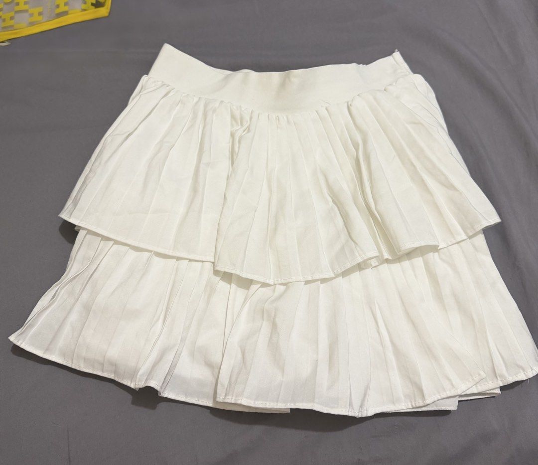 White Pleated Layered Mini Skirt (Category: Skirts) located in Las Pinas. Submitted by luvvjeon (Listing ID 1467318100, Image 2). Description: -from tiktok Used once.