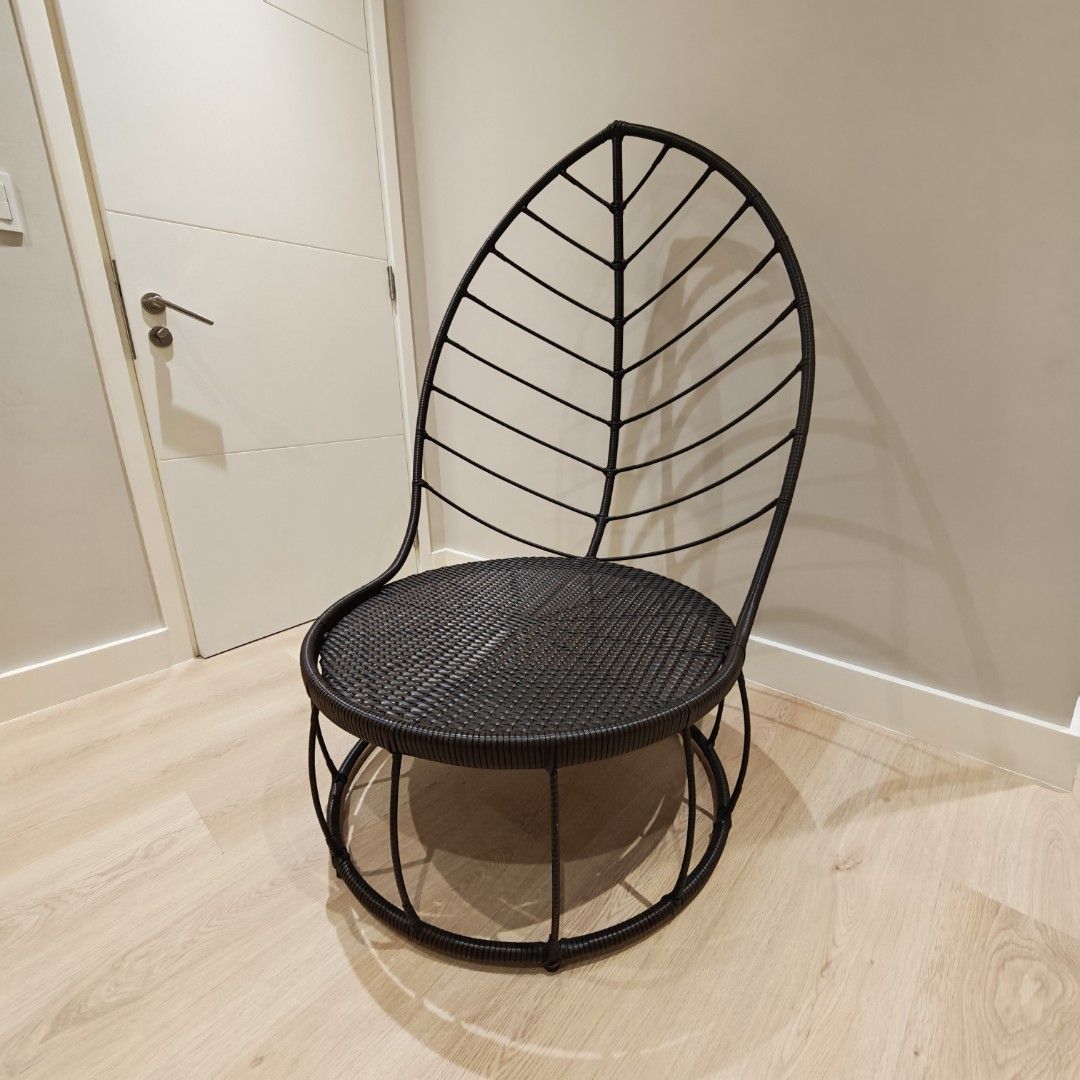Wicker Leaf Shaped Lounge Chair (Category: Chairs) located in Manila. Submitted by declutterauntie (Listing ID 1467326996, Image 1). Description: - Eye-catching leaf-shaped backrest design - Durable dark brown/black synthetic rattan weave - Perfect statement piece for living rooms, bedrooms, or balconies - Dimensions: Seat 76cm diameter Seat height 38cm Backrest height 135cm Backrest width 88cm .