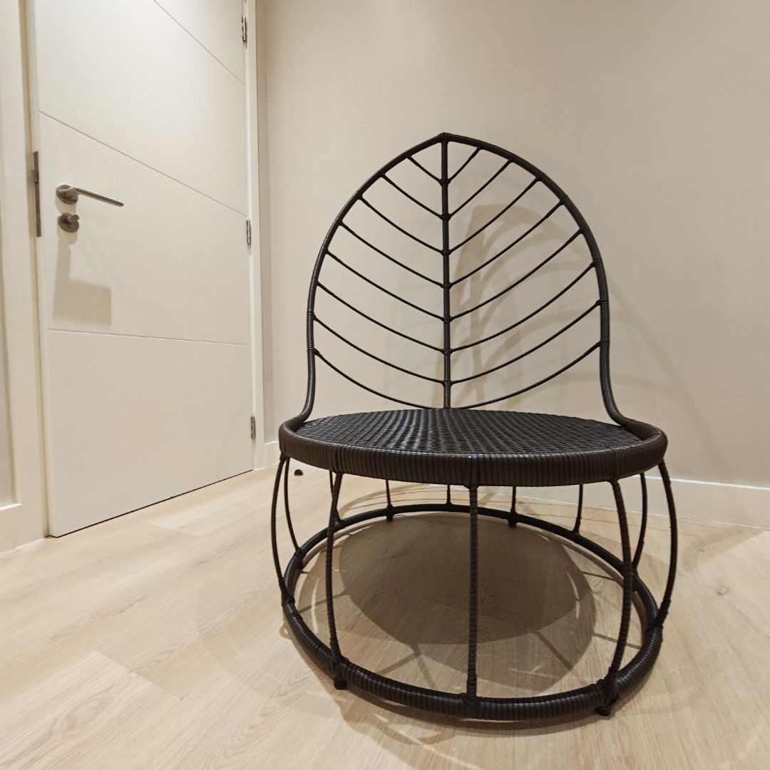 Wicker Leaf Shaped Lounge Chair (Category: Chairs) located in Manila. Submitted by declutterauntie (Listing ID 1467326996, Image 2). Description: - Eye-catching leaf-shaped backrest design - Durable dark brown/black synthetic rattan weave - Perfect statement piece for living rooms, bedrooms, or balconies - Dimensions: Seat 76cm diameter Seat height 38cm Backrest height 135cm Backrest width 88cm .