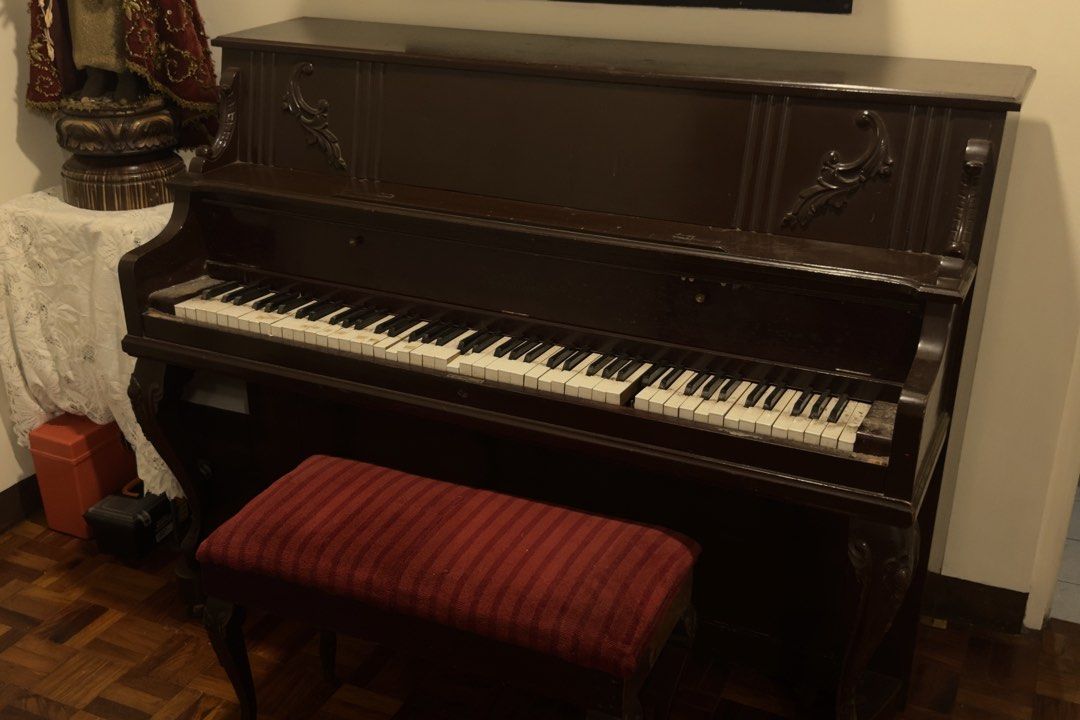 Winkelmann Upright Piano with Bench (Category: Musical Instruments) located in Manila. Submitted by snorluxxx24 (Listing ID 1467298529, Image 3). Description: RUSH SALE‼️ Authentic German vintage upright piano with matching upholstered bench. Great restoration project or classic home decor/display piece. Details & Issues: • Brand: Zeitter & Winkelmann (German) • Condition: Needs tuning and basic maintenance • Flaws: Missing 1 key and broken middl