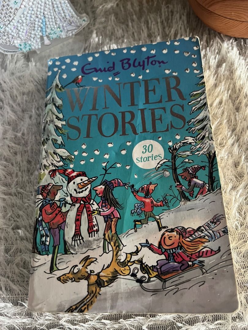 Winter Stories by Enid Blyton (Category: Storybooks) located in Las Pinas. Submitted by shesells.013 (Listing ID 1467294800, Image 1). Description: - Title: Enid Blyton Winter Stories (Paperback) - Content: 30 magical short tales filled with snow and cozy adventures - Perfect for: Bedtime reading or quiet afternoons - Features: Fun illustrations throughout the pages - Condition: Normal yellowing of pages from age, crease lines along cover edges a