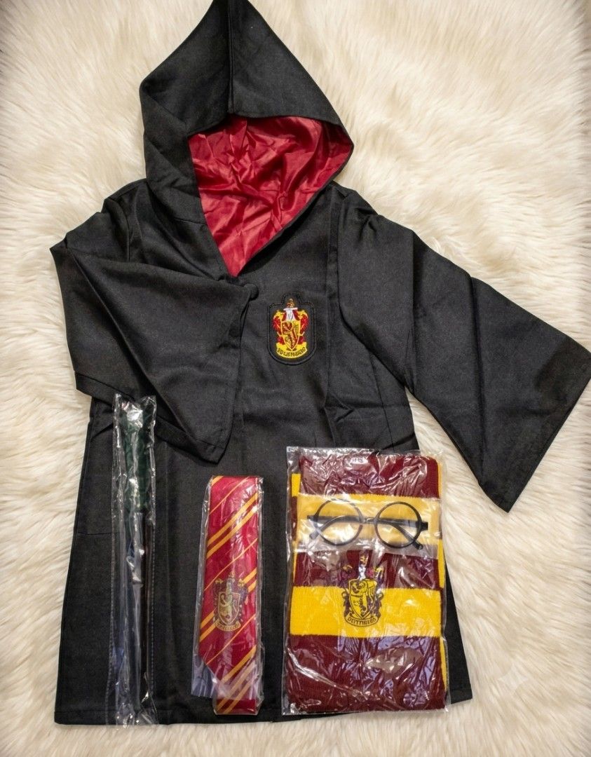 Wizard costume (Category: Coats, Jackets and Outerwear) located in Manila. Submitted by carolgaza14 (Listing ID 1467199821, Image 2). Description: ⚡️ - Wizard Magic School Costume (Complete 5-in-1 Set) 🪄 Perfect for Book Week, Cosplay, Halloween, and Theme Parties! INCLUSIONS (5 pcs set): 1. 1x Wizard Robe / Cape (Black with Maroon lining, hooded) 2. 1x Striped Tie (Maroon & Gold) 3. 1x Scarf / Muffler (Maroon & Yellow stripes) 4. 1x Round Glass