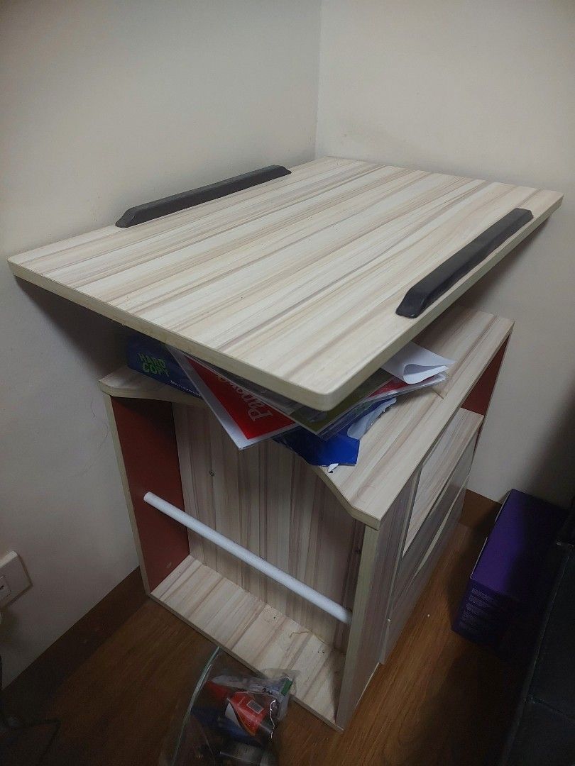 Wood Grain Rolling Computer Cart Desk Printer Stand (Category: Office Furniture & Fixtures) located in Manila. Submitted by boldlion.613922 (Listing ID 1467193909, Image 3). Description: - Multi-tier mobile desk stand with a sleek wood grain finish - Top shelf ideal for monitors or laptops - Middle shelf designed for quick-access accessories - Lower storage area keeps paperwork and small equipment organized - Equipped with smooth-rolling caster w