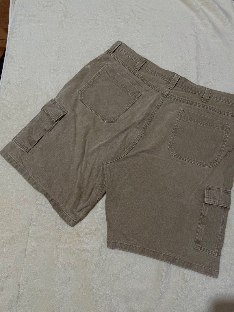 WRANGLER AUTHENTIC ISSUE CARGO SHORTS (Category: Shorts) located in Calapan. Submitted by shop_storeal (Listing ID 1467277046, Image 2). Description: ✨ WRANGLER AUTHENTIC ISSUE CARGO SHORTS 🗂️ Type: Utility Cargo Shorts / Gorpcore Earth-Tone Jorts 🎨 Color: Faded Khaki / Tan Earth Tone 📏 Dimes: 42W, 23L, 13.5 leghole • Condition: Like new, great structured condition. Heavy duty canvas-denim material. • Has very minor vintage fading/spots (barel