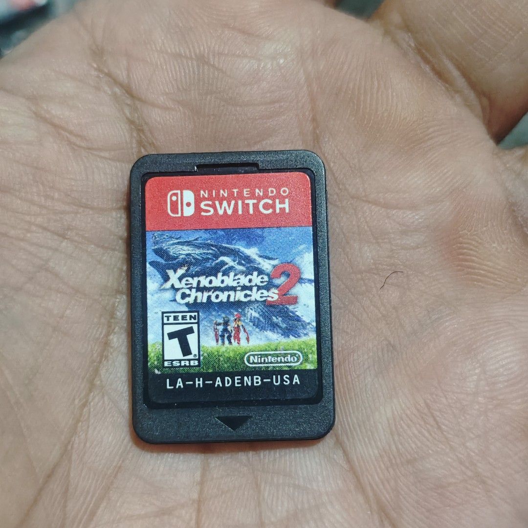Xenoblade Chronicles 2 Switch Game (Category: Nintendo) located in Quezon City. Submitted by shopme_gadget30 (Listing ID 1467333388, Image 1). Description: kindly read the details first for sale fixed price good Condition tested and working game card only compatible to Nintendo switch usa region Shoopppppeee —,✅ can check out pm for the linnnkkk (If shoopppee check out, price is higher because of shooppppeee deduction qc area meet up: sm north sh