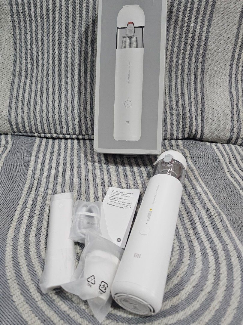 Xiaomi Mi Vacuum Cleaner Mini Cordless Handheld (Category: Vacuum Cleaner & Housekeeping) located in San Mateo. Submitted by reyshel08 (Listing ID 1467175271, Image 3). Description: - Item: Xiaomi Mi Vacuum Cleaner Mini (White) - Condition: Brand new, unused with original packaging intact - Design: Compact, flask-sized, and cordless for easy portability - Ideal Use: Perfect for cleaning cars, couches, and tight crevices - Inclusions: Original box