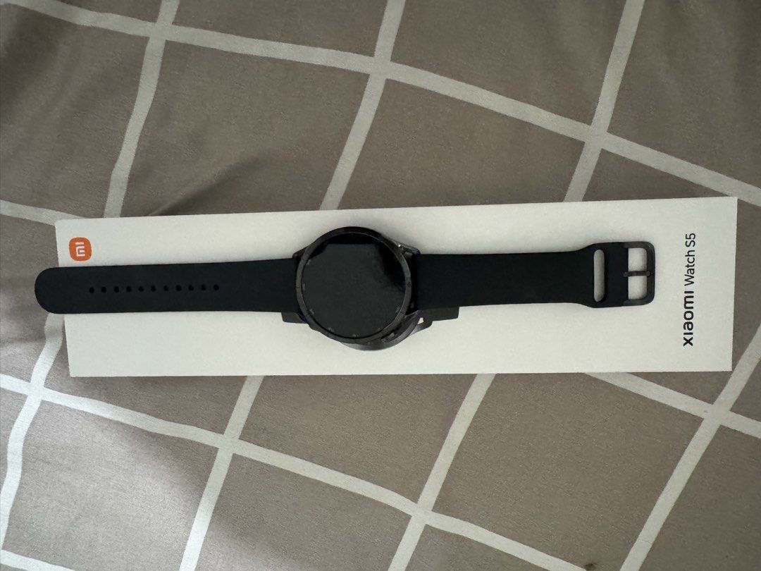 Xiaomi S5 - Smartwatch (Category: Wearables & Smart Watches) located in Pasay City. Submitted by mchntal (Listing ID 1467268629, Image 1). Description: - Brand/Model: Xiaomi Watch S5 Smartwatch - Color: Sleek black with a modern round display - Condition: Well-maintained, comes with original box as shown in photos - Features: Clear digital interface, comfortable silicone-style RFS: need funds.