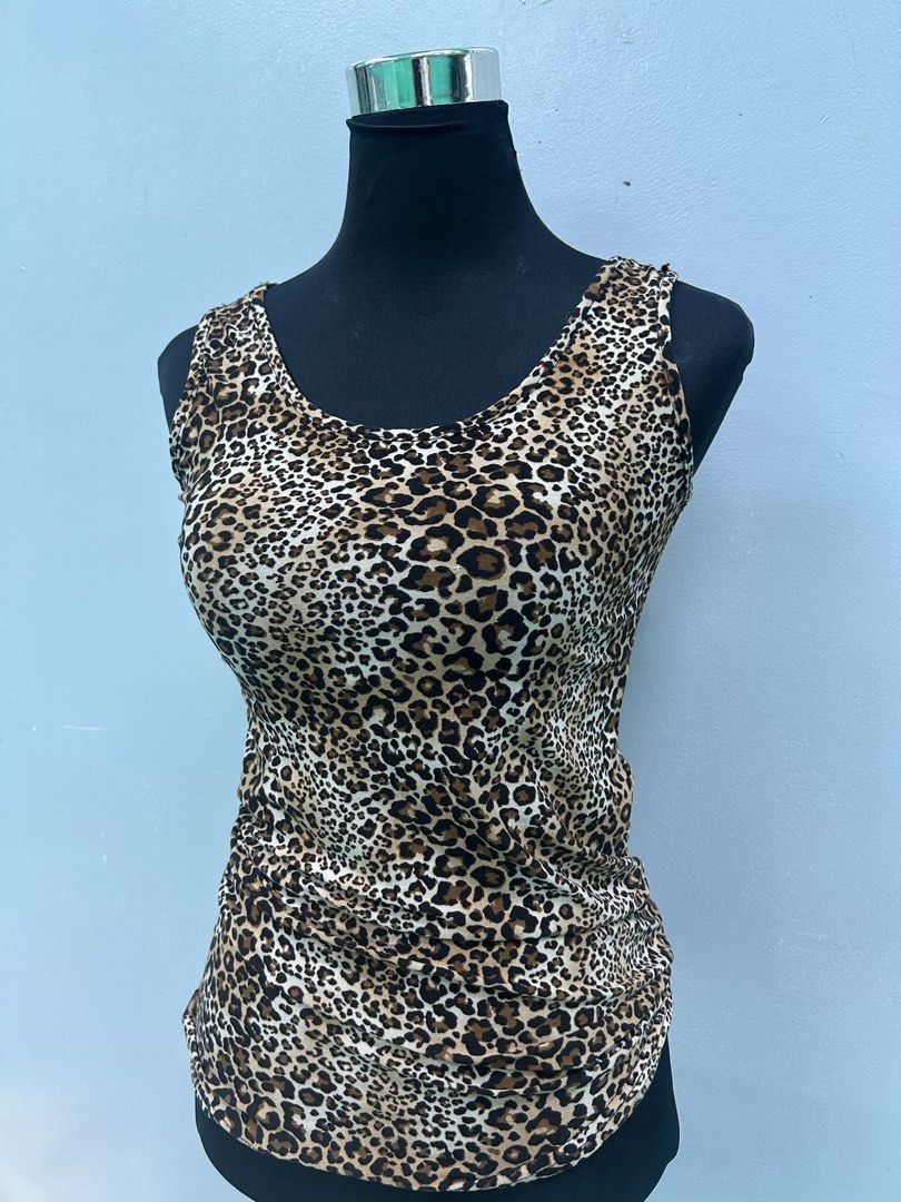 Y2K Leopard/Tiger Print Tank Top (Category: Sleeveless) located in Manila. Submitted by lindseyaaa (Listing ID 1467287530, Image 2). Description: Item Info: Brand: No brand Condition: Pre-loved / Ukay (Good condition) Size: Fits XS to Medium 📍Pickup/Shipping: Enrique M. Razon Sports Center, De La Salle University- Manila 💬 Message for inquiries or order reservation!.