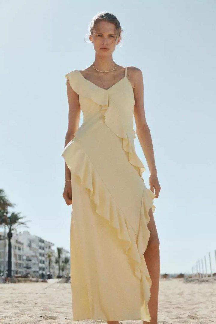 BNWT Yellow asymmetric ruffle maxi dress (Category: Dresses) located in Makati City. Submitted by mariamarts (Listing ID 1467313319, Image 1). Description: .