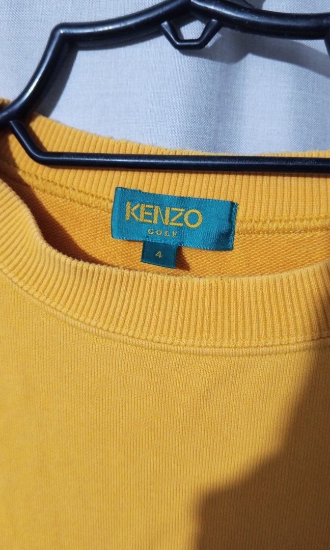 Yellow Kenzo Golf sweatshirt (Category: Coats, Jackets and Outerwear) located in Cavite. Submitted by newmango.95cecd (Listing ID 1467314942, Image 3). Description: Size: L Unisex Loc: Silang, Cavite 📦 Delivery: Lalamove or J&T only.