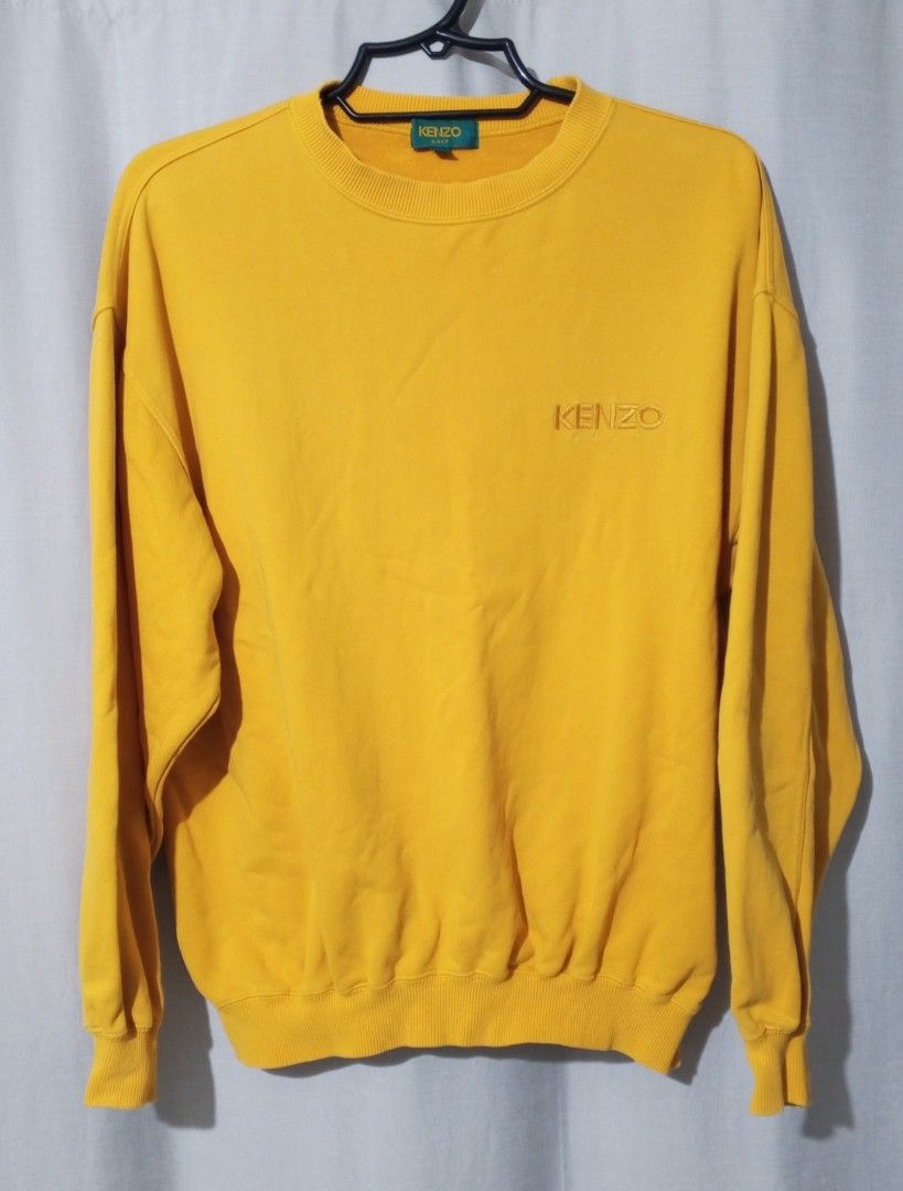 Yellow Kenzo Golf sweatshirt (Category: Coats, Jackets and Outerwear) located in Cavite. Submitted by newmango.95cecd (Listing ID 1467314942, Image 1). Description: Size: L Unisex Loc: Silang, Cavite 📦 Delivery: Lalamove or J&T only.