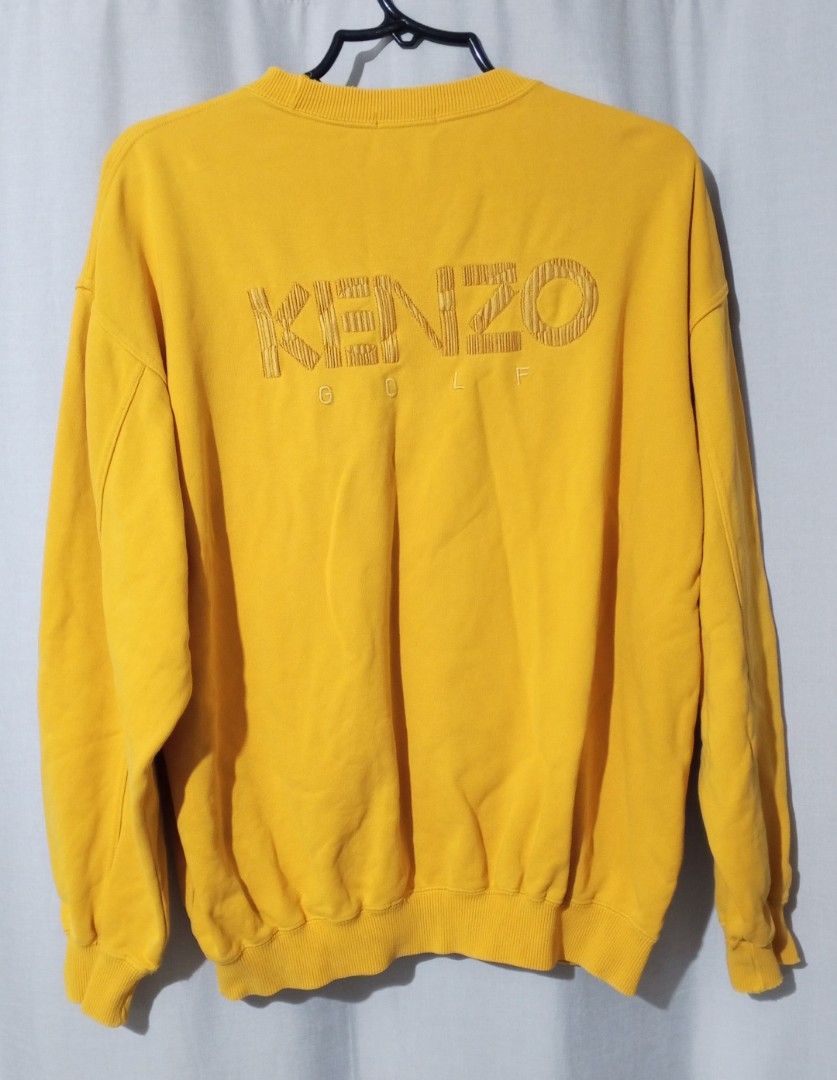 Yellow Kenzo Golf sweatshirt (Category: Coats, Jackets and Outerwear) located in Cavite. Submitted by newmango.95cecd (Listing ID 1467314942, Image 2). Description: Size: L Unisex Loc: Silang, Cavite 📦 Delivery: Lalamove or J&T only.