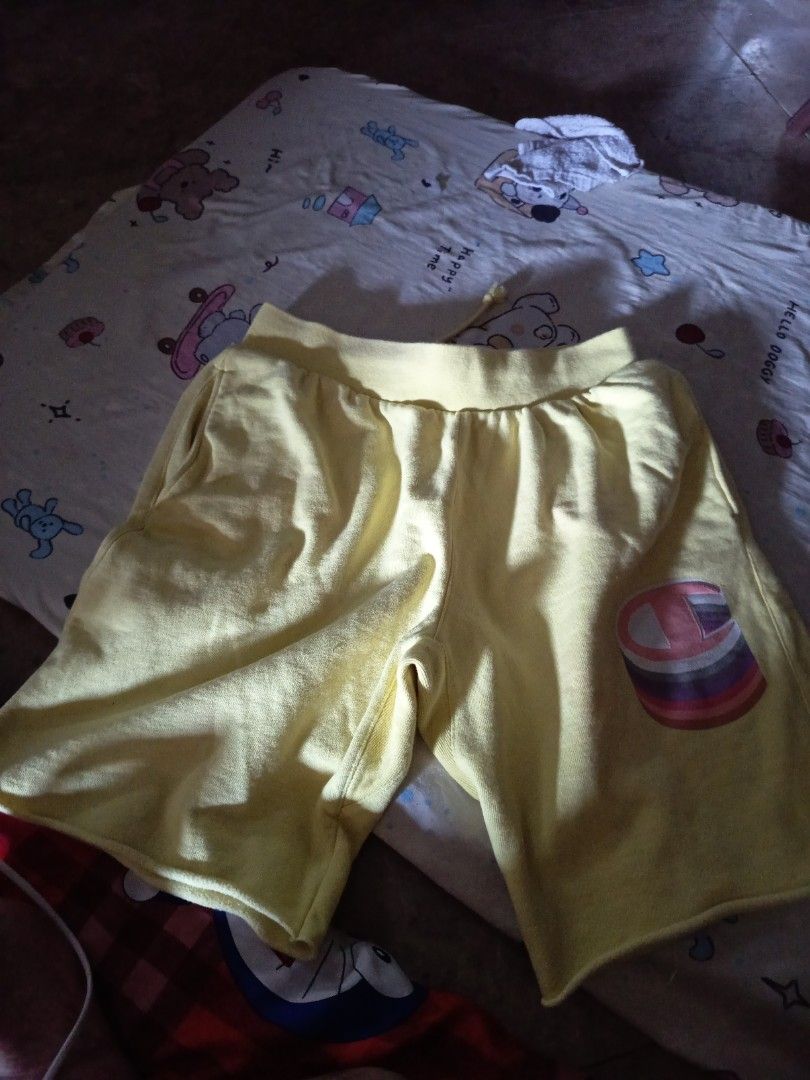 YELLOW LARGE MEN CHAMPION SHIRT (Category: Shorts) located in Manila. Submitted by rissie_15gg (Listing ID 1467209554, Image 1). Description: .
