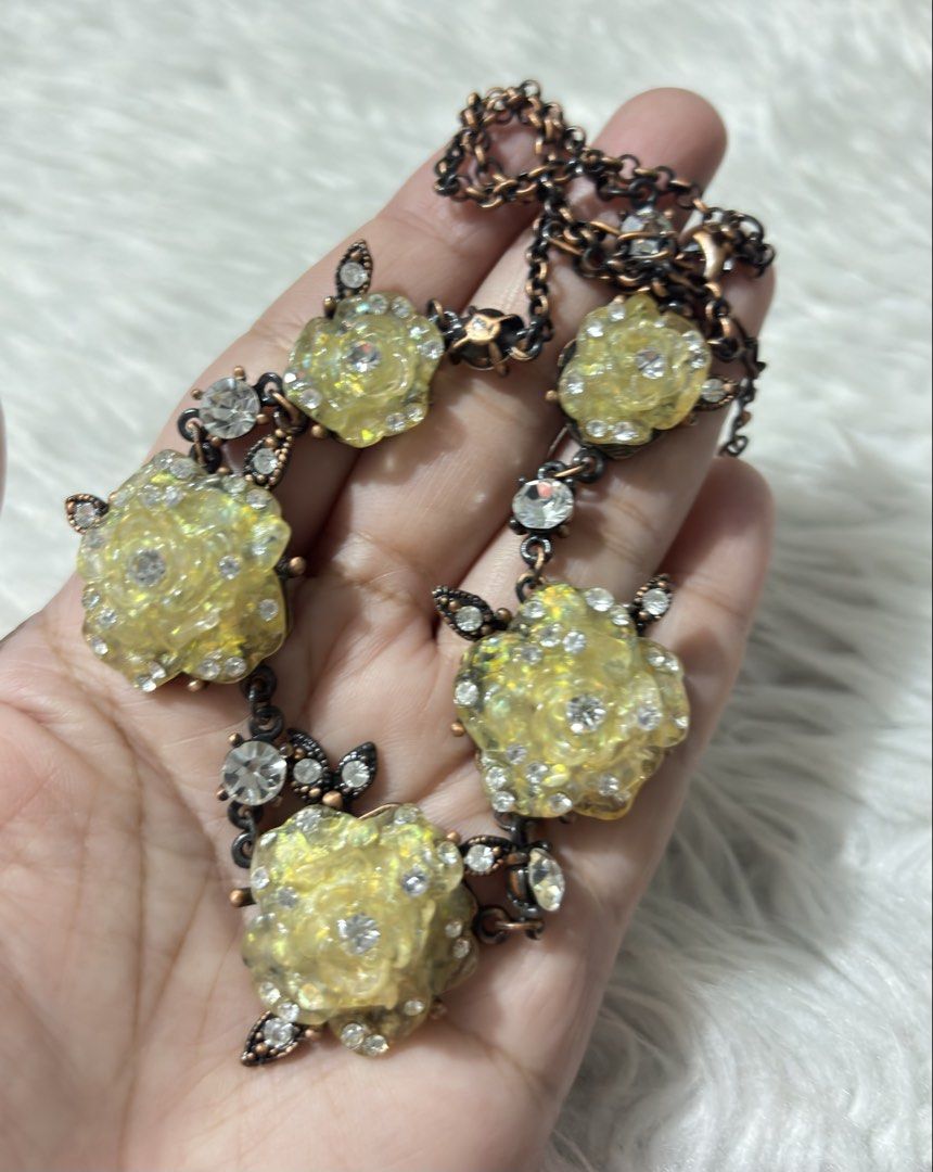 Yellow rose-shaped floral Statement Necklace (Category: Necklaces) located in Paranaque City. Submitted by dalle_closet (Listing ID 1467318935, Image 2). Description: design niya ung mga may dark na color length: 16 to 20 inches.