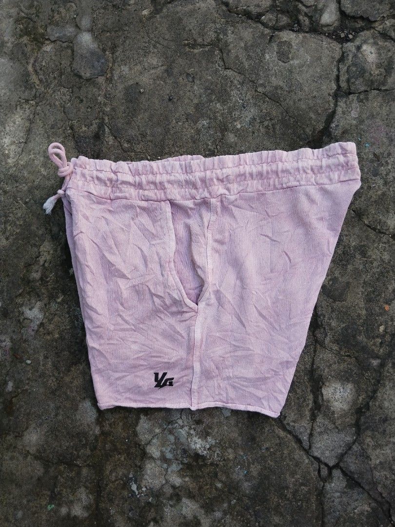 YoungLA Pink Cotton Drawstring Shorts Size L (Category: Shorts) located in Tabaco. Submitted by skycat_29 (Listing ID 1467173660, Image 2). Description: - Brand: YoungLA - Color: Pink - Size: Large (L) - Material: 100% Cotton - Fit: Relaxed fit, great for casual wear or lounging - Features: Elastic waistband with drawstring closure - Pockets: Side pockets and one back pocket with branded label - Hem: Raw hem finish at the bottom.