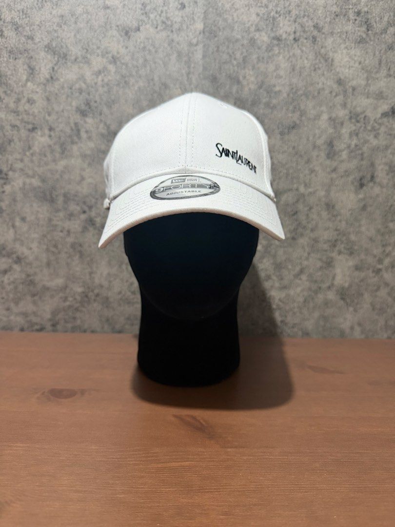 Ysl x New era - Embroided logo White cap (Category: Caps & Hats) located in Cavite. Submitted by commoncourtesy (Listing ID 1467347944, Image 1). Description: One size fits all.