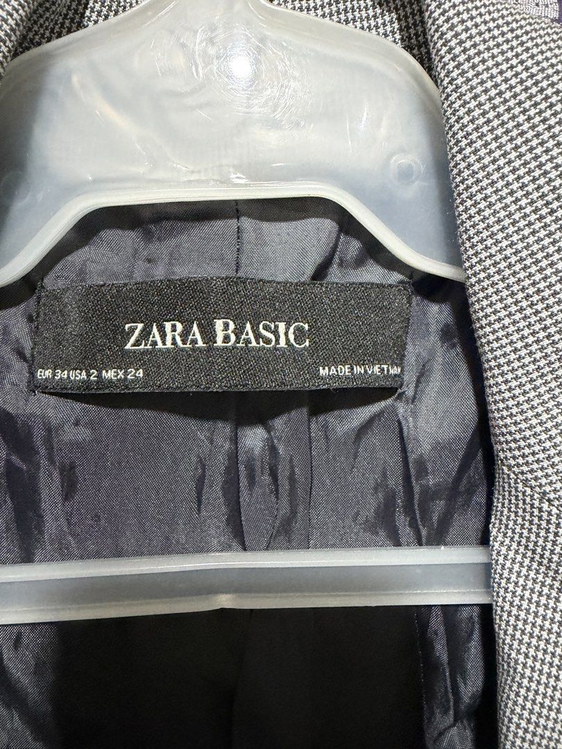 Zara Basic Houndstooth Blazer Size EUR 34 USA 2 (Category: Coats, Jackets and Outerwear) located in Mandaluyong City. Submitted by shopria0116 (Listing ID 1467296662, Image 3). Description: - Brand: Zara Basic - Style: Grey and white houndstooth tailored blazer - Details: Single-button closure, classic lapels, structured shoulders, two front flap pockets - Lining: Fully lined in black - Origin: Made in Vietnam - Condition: Clean inside and out - 