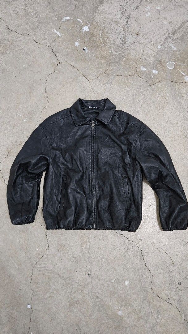 Zara Black Leather Jacket (Category: Coats, Jackets and Outerwear) located in Alfonso. Submitted by jbcamet (Listing ID 1467310836, Image 1). Description: - Brand: Zara - Color: Black - Size: L (True to size) - Material: Quality leather construction with inner lining - Features: Full zip front, classic collar, two side welt pockets, elastic cuffs and hem.