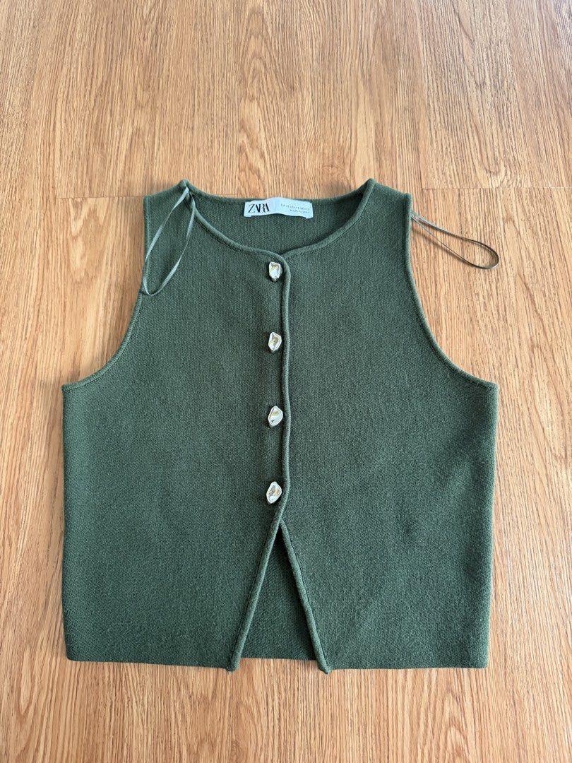 Zara Green Knitted Top with Silver Buttons (Category: Sleeveless) located in Quezon City. Submitted by morgan_rysblk (Listing ID 1467185999, Image 1). Description: - Brand: Zara - Size: XS - Color: Olive Green - My favorite! Too small na for me. Really good quality.