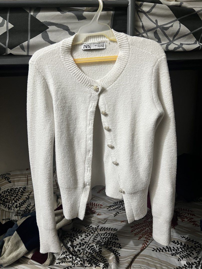 Zara Knit Cardigan (Category: Coats, Jackets and Outerwear) located in Manila. Submitted by kitdeclutter (Listing ID 1467205164, Image 1). Description: Zara Cream White Knot Cardigan RFS: Wrong Size and I don’t use it anymore - In good condition - Doesn’t have any flaws .