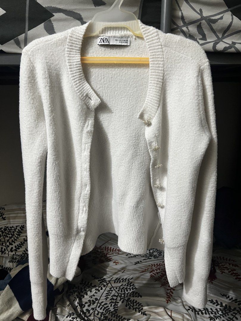 Zara Knit Cardigan (Category: Coats, Jackets and Outerwear) located in Manila. Submitted by kitdeclutter (Listing ID 1467205164, Image 2). Description: Zara Cream White Knot Cardigan RFS: Wrong Size and I don’t use it anymore - In good condition - Doesn’t have any flaws .