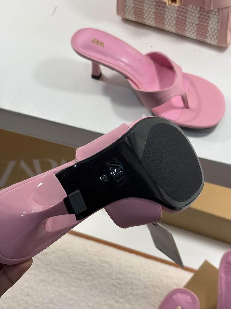ZARA Pink Kitten Heel Thong Sandals (Category: Heels) located in Imus. Submitted by bagsandshoes.ph (Listing ID 1467323025, Image 2). Description: - Brand: ZARA - Style: Pink kitten heels / thong sandal - Features: Stretchy toe strap, comfy padded insole, black rubber sole with intact heel tips - Condition: Brand new with tag attached - Inclusion: Original Zara paper bag included.