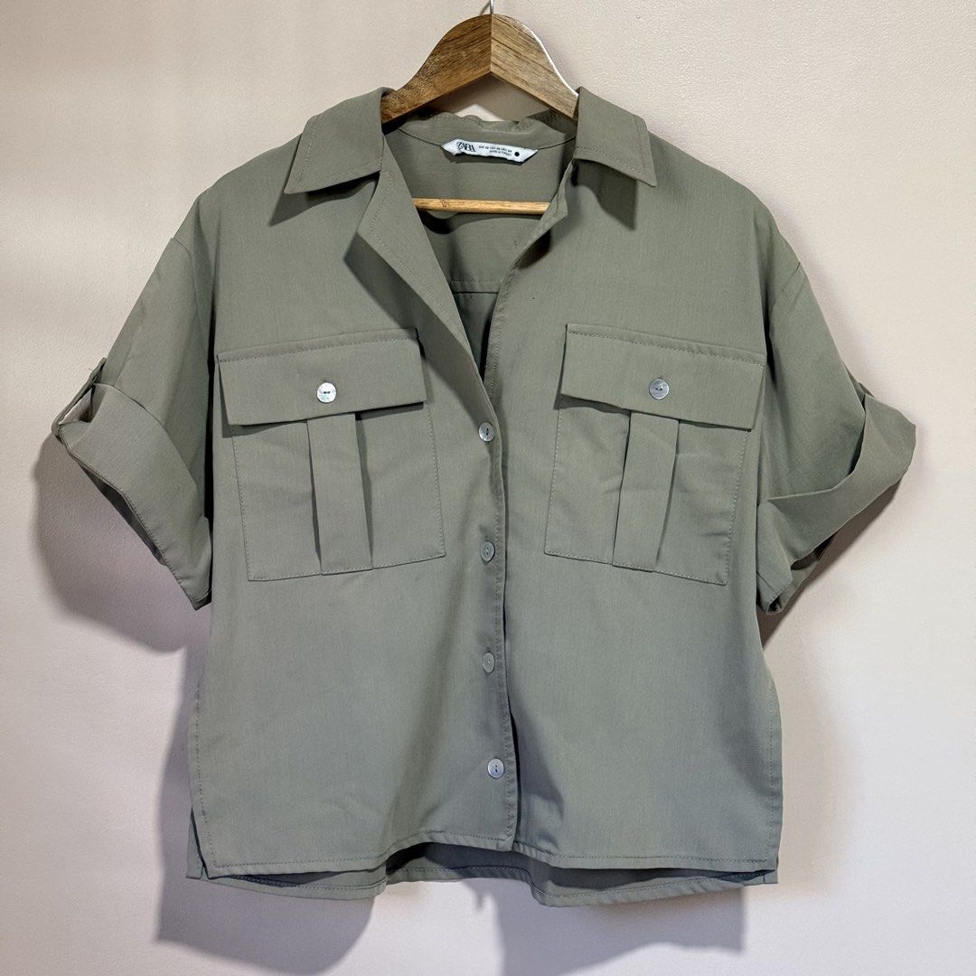 Zara Utility Buttondown Shirt (Category: Blouses) located in Surigao. Submitted by nenafuentes (Listing ID 1467178294, Image 1). Description: Dual front patch pockets and roll up sleeves Size XS on tag but runs oversized Best fits M-L.