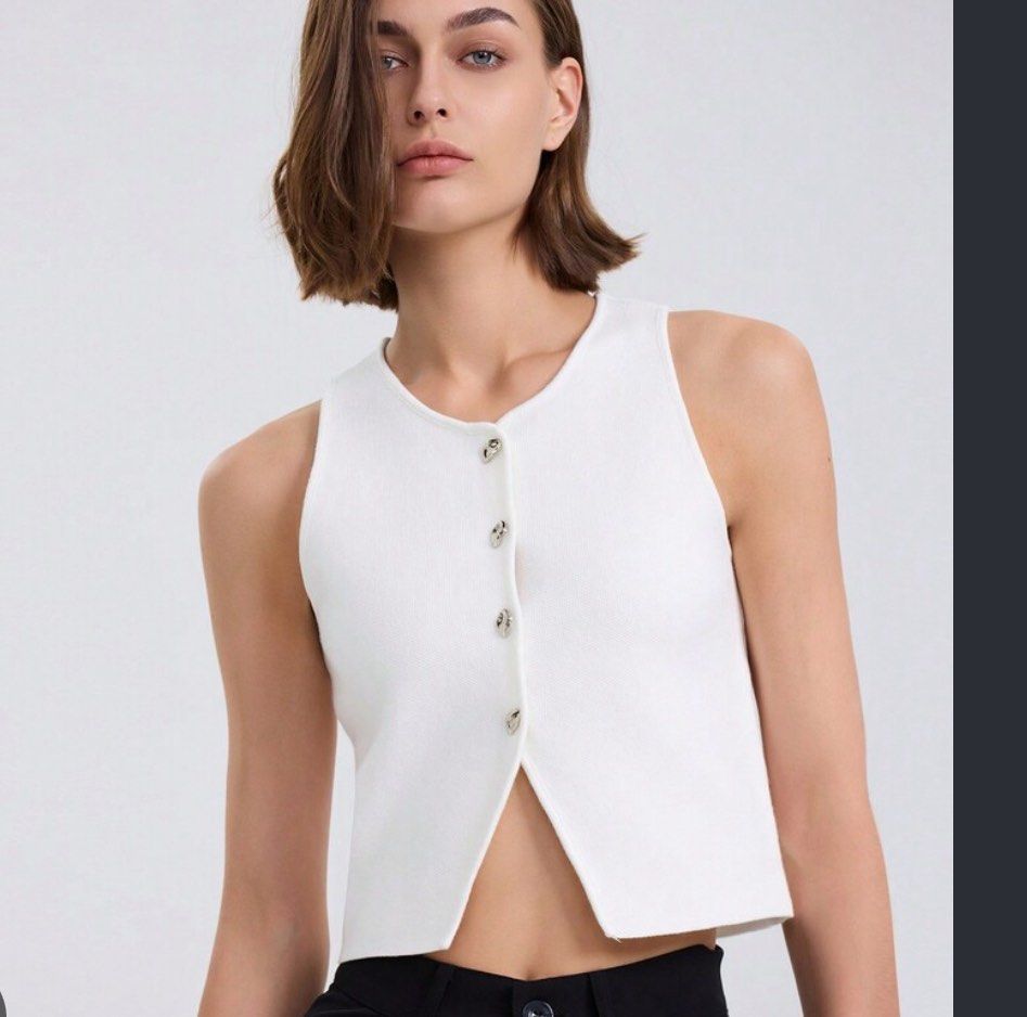 ZARA White Knitted Button-Up Tank Top (Category: Sleeveless) located in Cebu City. Submitted by lavitify (Listing ID 1467286202, Image 1). Description: - Brand: ZARA. Size Small - Style: Sleeveless knit crop top with round neck and decorative silver buttons - Color: Crisp white - Material: Soft, stretchy ribbed knit - Fit: Cropped (perfect for high-waisted bottoms) - Condition: Worn only thrice, like new - rfs: used thrice, not my style anymore .