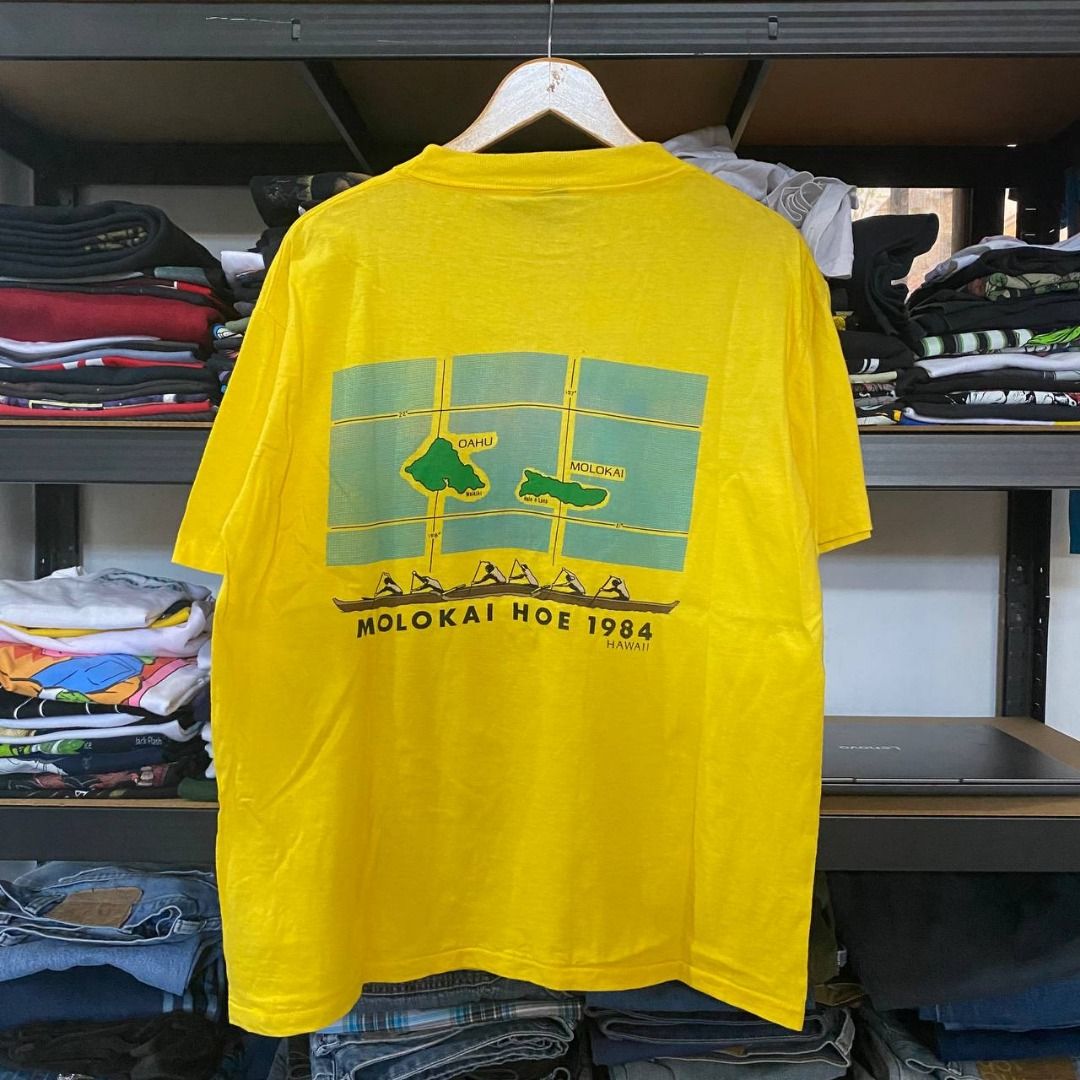 1984 Hawaii Graphic Hoe Shirt (Category: Tshirts & Polo Shirts ) located in Legazpi City. Submitted by southeastjunkies (Listing ID 1467558365, Image 1). Description: 80's Hawaii Canoe Molokai Hoe Shirt (ssatw, paper thin like, Anvil Gold Bar tag) 22.5x27 (Large) minimal stains.