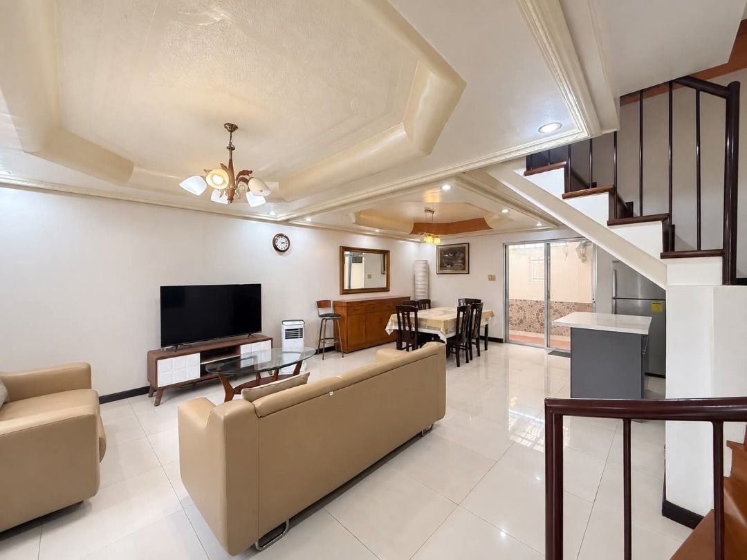 2-Storey House with Balcony and Modern Interior (Category: House & Lot) located in Caloocan City. Submitted by bags1102 (Listing ID 1467481965, Image 3). Description: - 2-storey property with eye-catching red and yellow exterior paint - Front gate and private 2nd-floor balcony - Open-concept downstairs living and dining area with sliding glass doors - Elegant tiled flooring and tray ceiling with built-in lighting fixtures - Includes dining table 