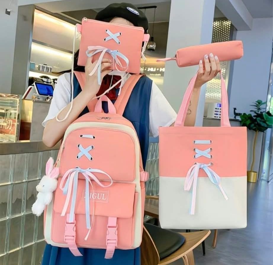 4-Piece School Bag Set with Ribbon Accent (Category: Backpacks) located in Manila. Submitted by breansfinds (Listing ID 1467484191, Image 2). Description: - Complete 4-in-1 set: Large backpack, tote bag, shoulder bag, and pencil case - Available colors: Chic Black and Sweet Pink - Stylish design featuring front lace-up pastel ribbons - Comes with a free adorable plush bunny keychain - Spacious compartments ideal for school, work, or casual gala -