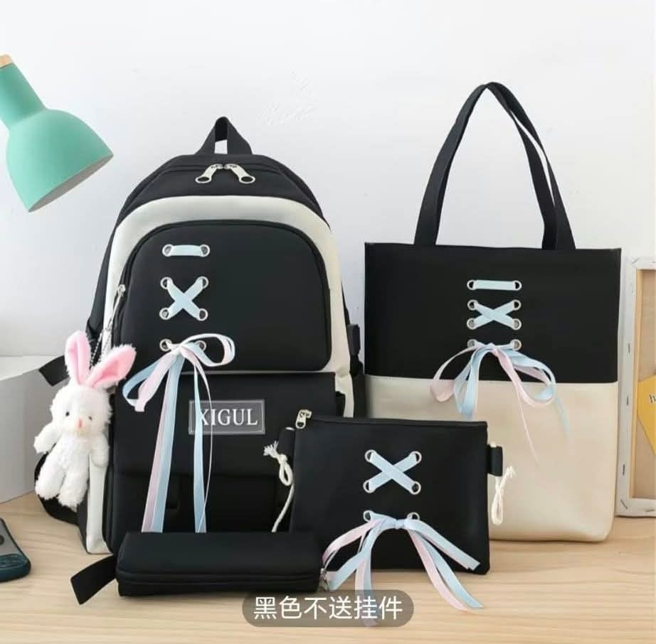 4-Piece School Bag Set with Ribbon Accent (Category: Backpacks) located in Manila. Submitted by breansfinds (Listing ID 1467484191, Image 1). Description: - Complete 4-in-1 set: Large backpack, tote bag, shoulder bag, and pencil case - Available colors: Chic Black and Sweet Pink - Stylish design featuring front lace-up pastel ribbons - Comes with a free adorable plush bunny keychain - Spacious compartments ideal for school, work, or casual gala -
