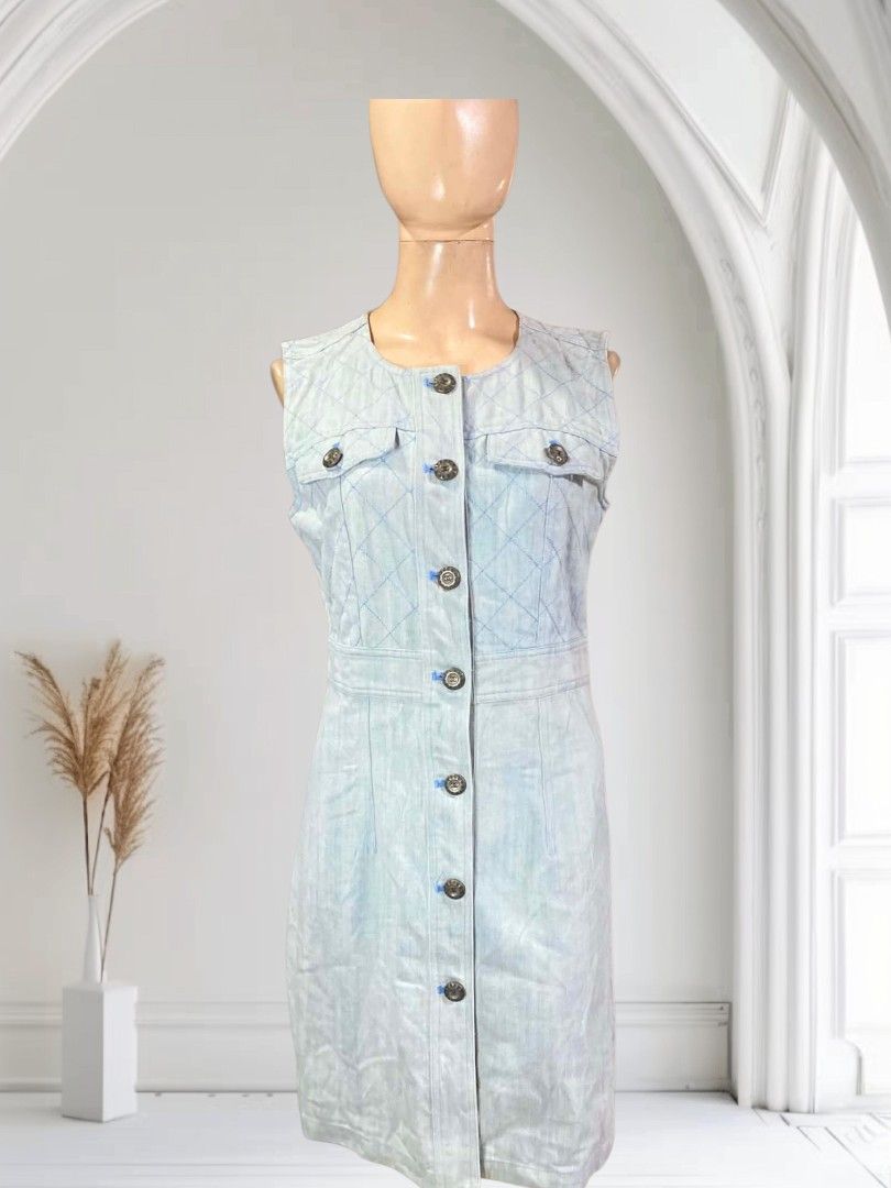✨ CHANEL Vintage Denim Shift Mini Dress ✨ (Category: Dresses) located in Manila. Submitted by shopyourstyleph (Listing ID 1467535740, Image 3). Description: ✨ CHANEL Vintage Denim Shift Mini Dress ✨ This is a Chanel Light Wash Denim Sleeveless Dress, featuring a classic shift or straight silhouette crafted from faded blue cotton denim. The design elements showcase a signature quilted diamond pattern texture across the chest panel, balanced by str
