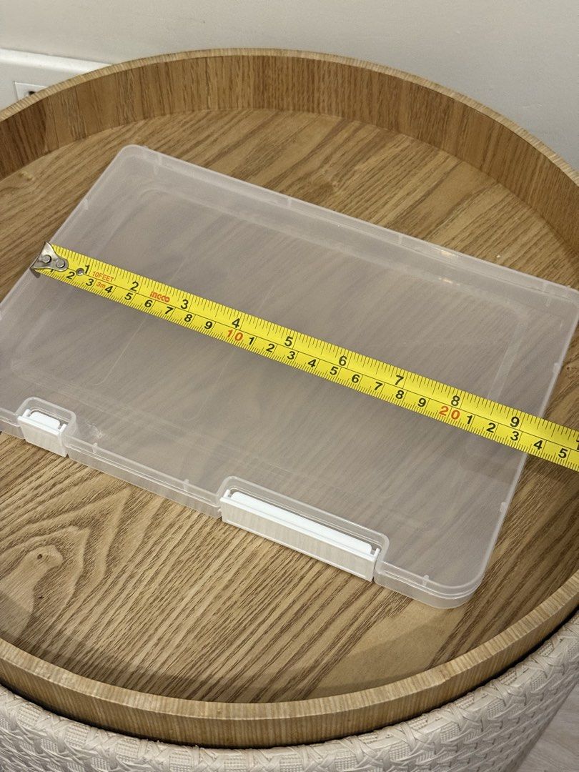 A5 Clear Plastic Document Storage Box Organizer with White Latches (Category: Storage Boxes & Baskets) located in Marikina City. Submitted by lovegoeson (Listing ID 1467475728, Image 2). Description: - Type: Clear plastic flat storage box - Size: Approx. 25cm in length - Features: Slim, stackable design with secure white snap closures - Condition: Excellent, no cracks or major scratches - Best for: Organizing stationery, papers, and small items.