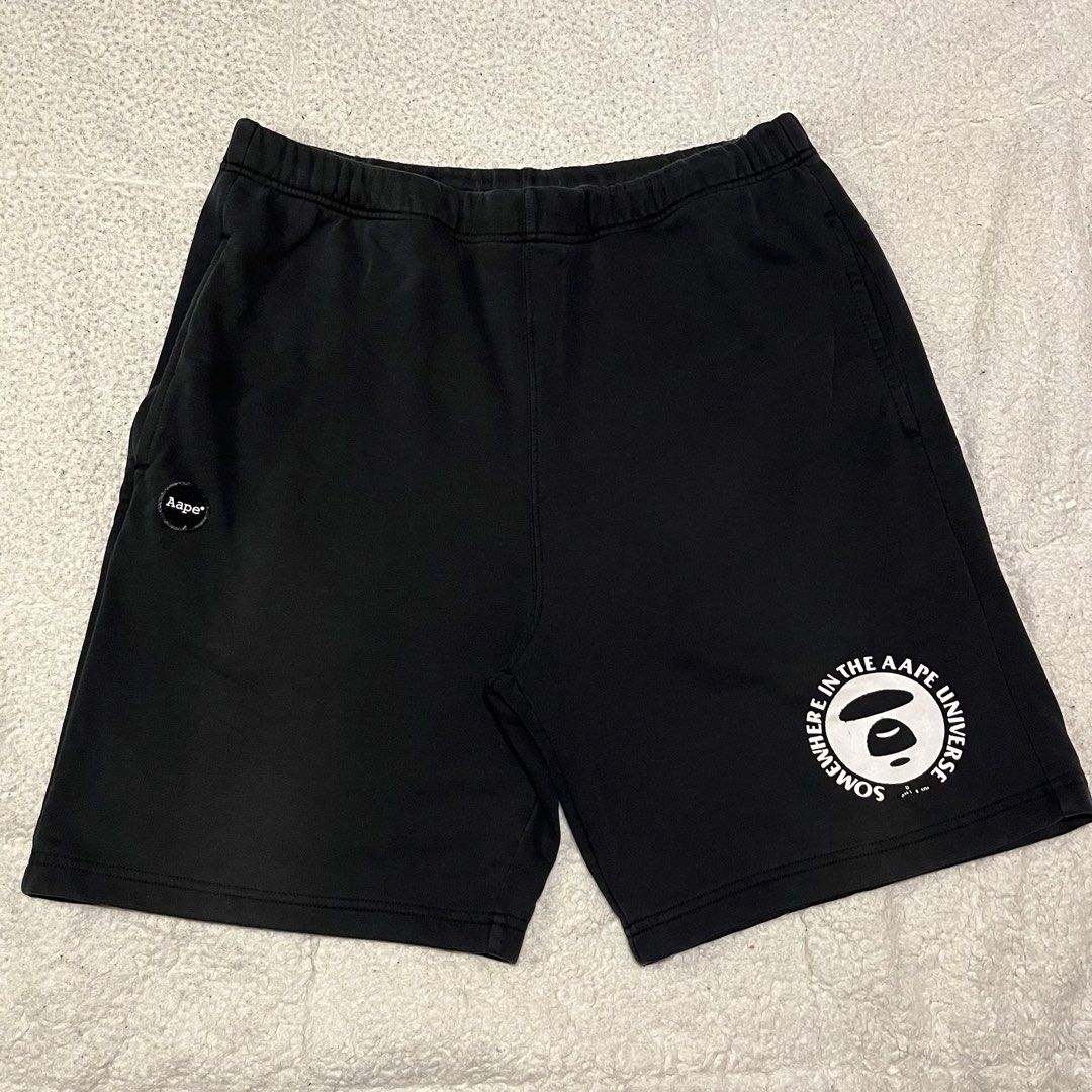 AAPE black log shorts (Category: Shorts) located in Coron. Submitted by tr1p2thr1ft (Listing ID 1467526195, Image 3). Description: Issue indicated on the pics 9.2/10 cr Authentic 20 length 12 hem .