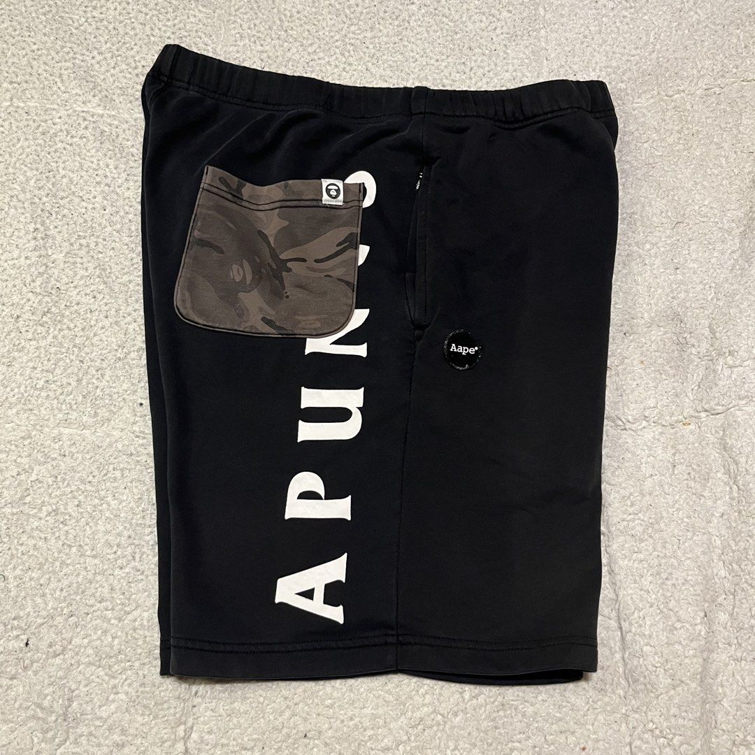 AAPE black log shorts (Category: Shorts) located in Coron. Submitted by tr1p2thr1ft (Listing ID 1467526195, Image 1). Description: Issue indicated on the pics 9.2/10 cr Authentic 20 length 12 hem .