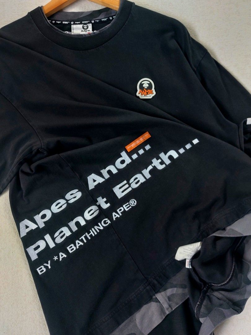 Aape Moonface Logo Camo Tee (Category: Tshirts & Polo Shirts ) located in Palayan City. Submitted by akhai420 (Listing ID 1467404819, Image 3). Description: Size: XL Dimensions: W24-L29 Condition: Like new Flaws: None Kindly, message me for more details..
