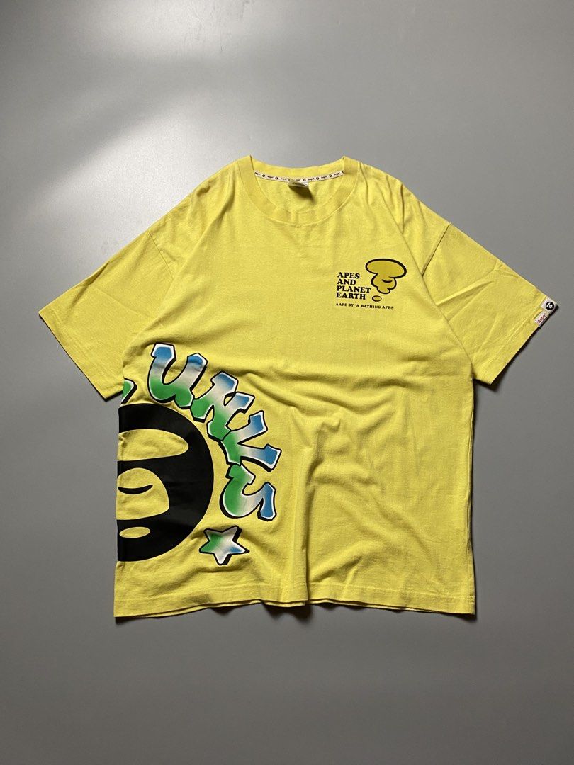 Aape Wrap Around - Size Large-XL (Category: Tshirts & Polo Shirts ) located in Cebu City. Submitted by maicoh230 (Listing ID 1467513770, Image 1). Description: Aape Yellow Tee. Half Wrap Around. ▫️ Condition: 9/10 ▫️ Color: 9/10 ▫️ Size: L-XL ▫️ Dimensions: W23 L29 ▫️ Flaw/s: 🛒 Mine: 800 REMINDERS 📍 Cebu City 💳 Payment First Policy 📦 J&T | Maxim (Within Cebu) 📸 Color may vary slightly due to lighting..