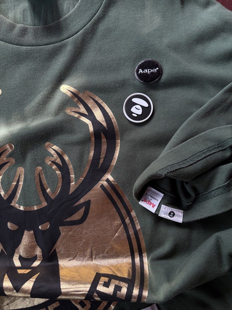 AAPE X NBA MILWAUKEE (Category: Tshirts & Polo Shirts ) located in Kabankalan. Submitted by thriftallday_961 (Listing ID 1467489017, Image 3). Description: Please check the photos for the tags, labels, and overall condition .