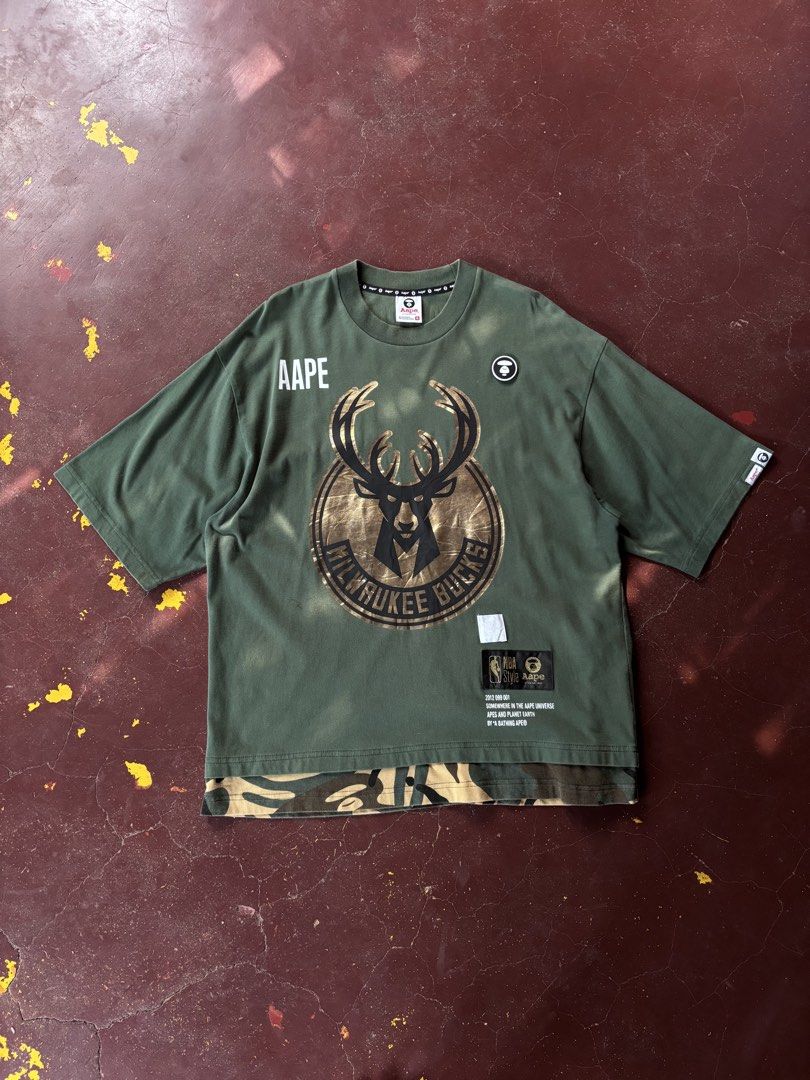AAPE X NBA MILWAUKEE (Category: Tshirts & Polo Shirts ) located in Kabankalan. Submitted by thriftallday_961 (Listing ID 1467489017, Image 1). Description: Please check the photos for the tags, labels, and overall condition .